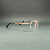 عینک طبی مردانه و زنانه فلزی فریم لس پلیس Police مدل 202305