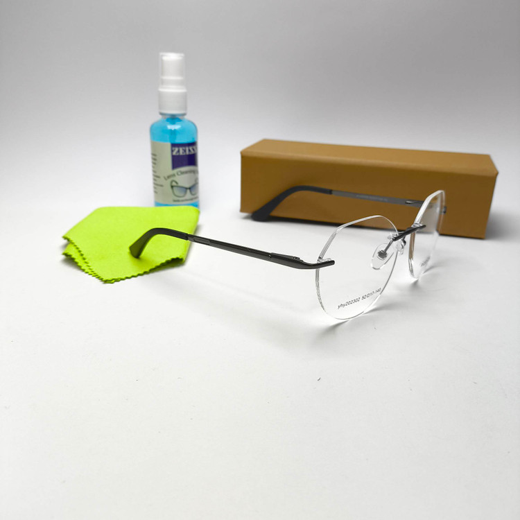 عینک طبی فریم لس فلزی برند پلیس Police مدل 202302